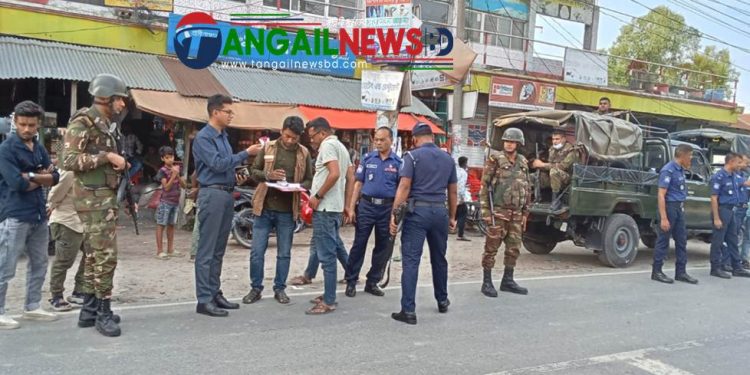 বাসাইলে হেলমেট ও লাইসেন্স না থাকায় দুইজনকে জরিমানা
