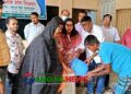ধনবাড়ীতে দুস্থ ৩ হাজার ৮৫ পরিবারের মাঝে চাল বিতরণ